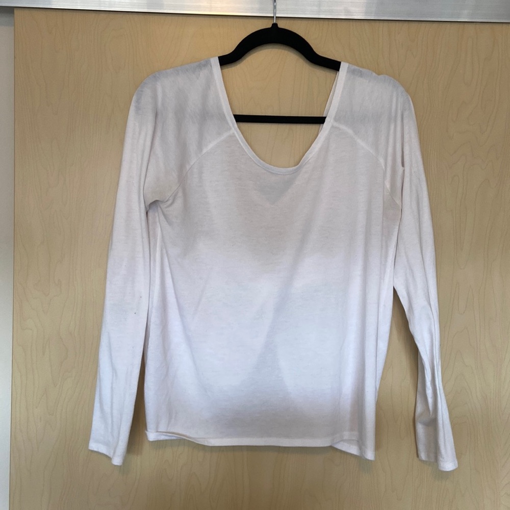White long sleeve fabletics shirt.